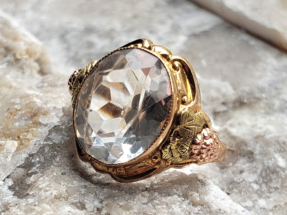 Rock Crystal Ring set in tri-colour gold / Black Hills Gold Ring