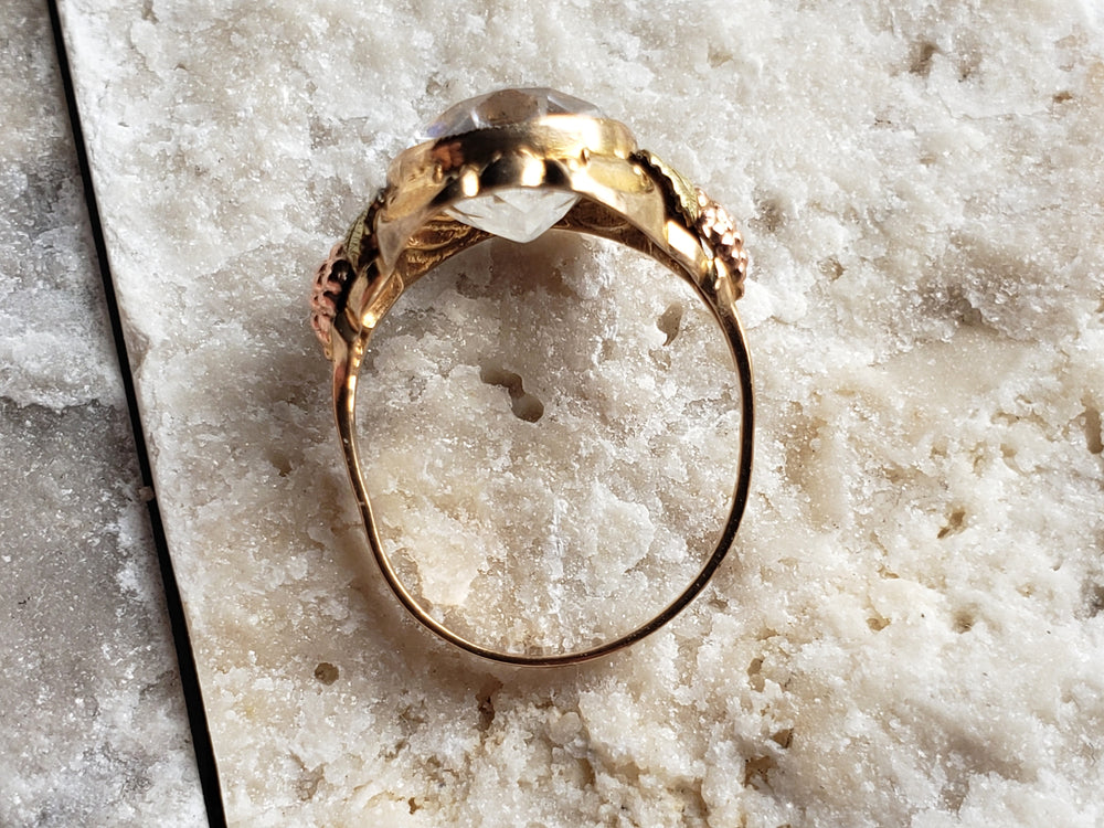 Rock Crystal Ring set in tri-colour gold / Black Hills Gold Ring