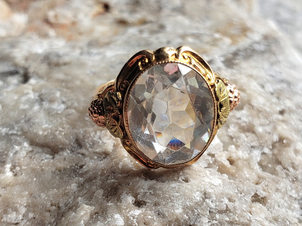 Rock Crystal Ring set in tri-colour gold / Black Hills Gold Ring
