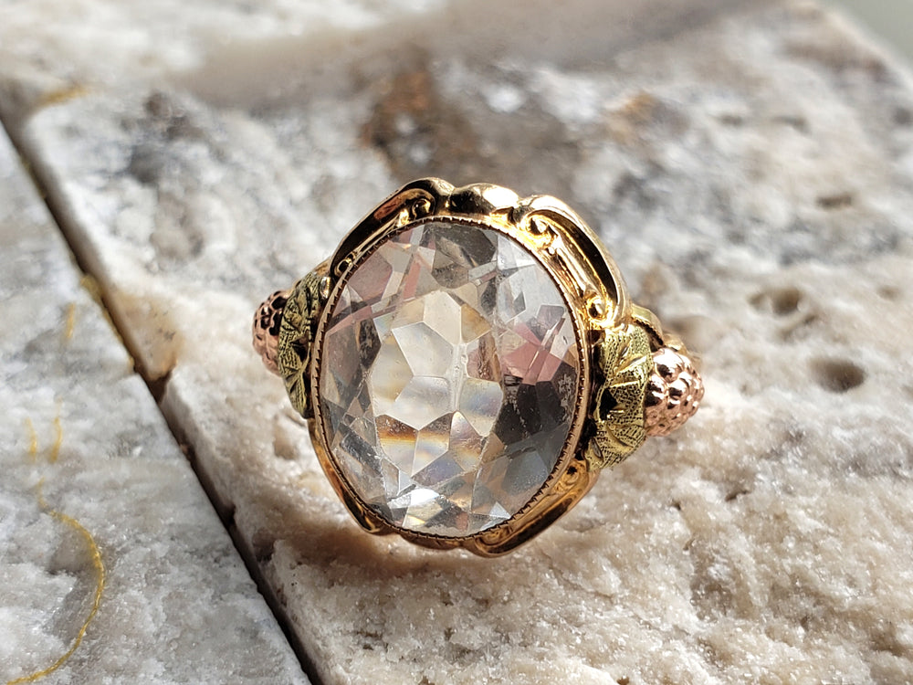 Rock Crystal Ring set in tri-colour gold / Black Hills Gold Ring