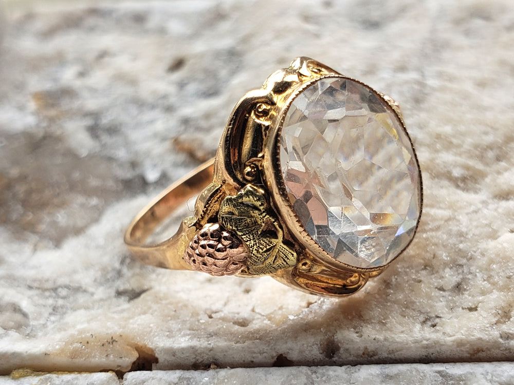 Rock Crystal Ring set in tri-colour gold / Black Hills Gold Ring